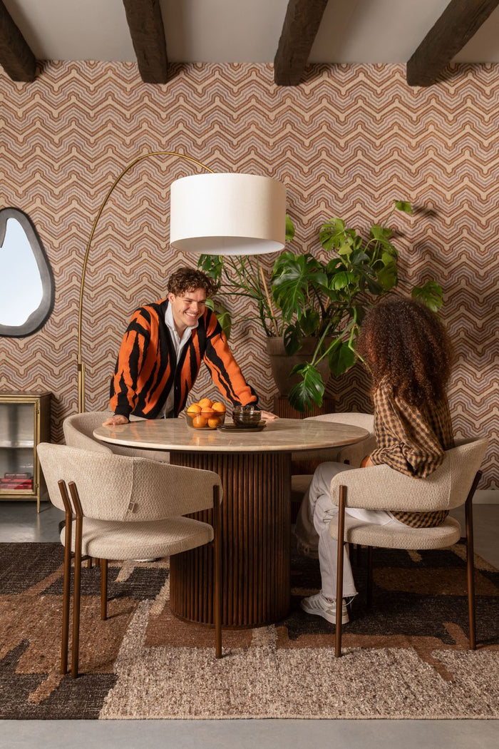 Naida dining chairs around a round dining table