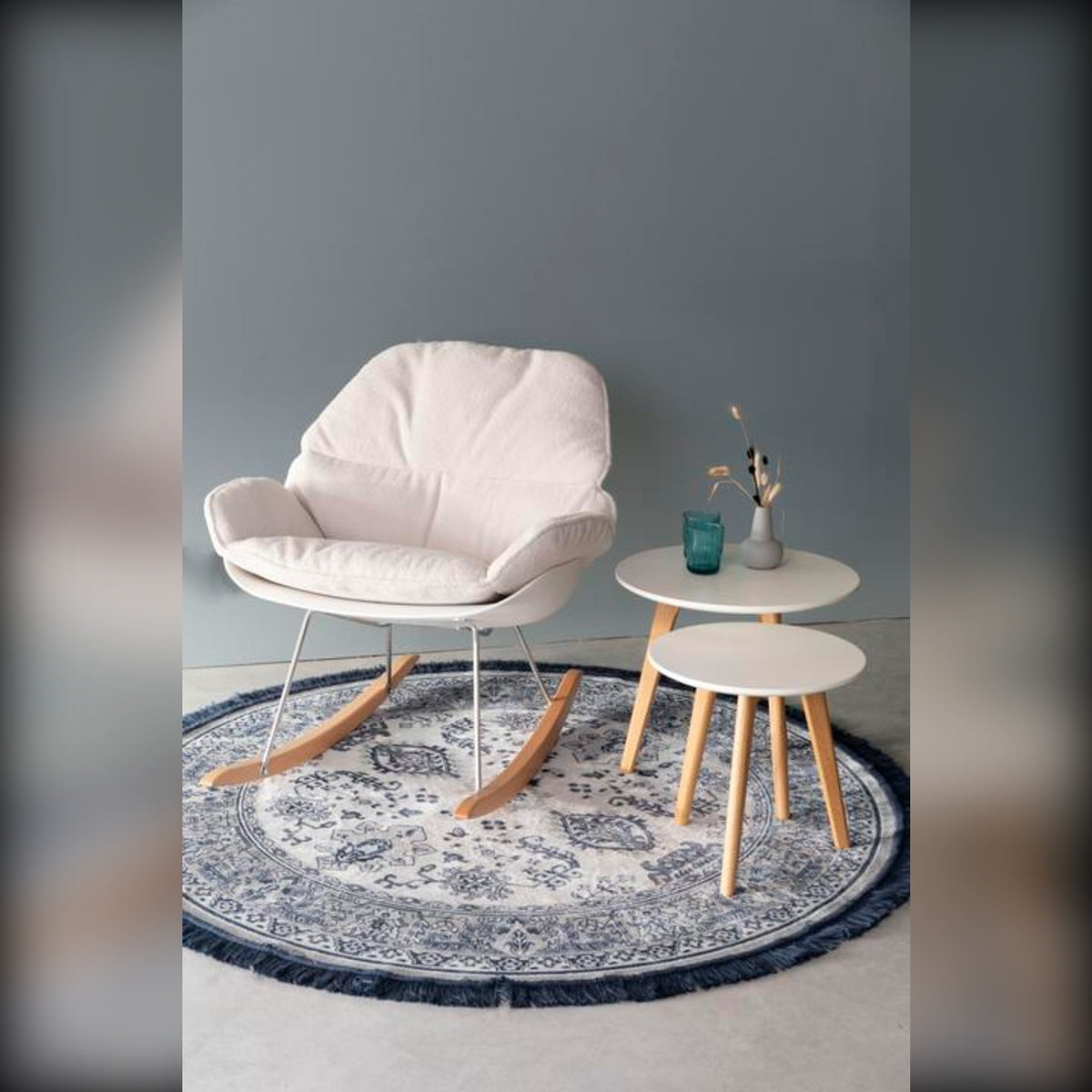 Lounge Chair Rocky Off White Domestica – Lifestyle – With a Side Table on a Patterned Rug