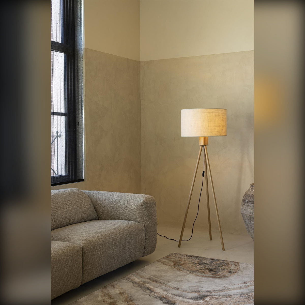 Floor Lamp Fan Bamboo Domestica – Lifestyle – Beside a Sofa by a Window