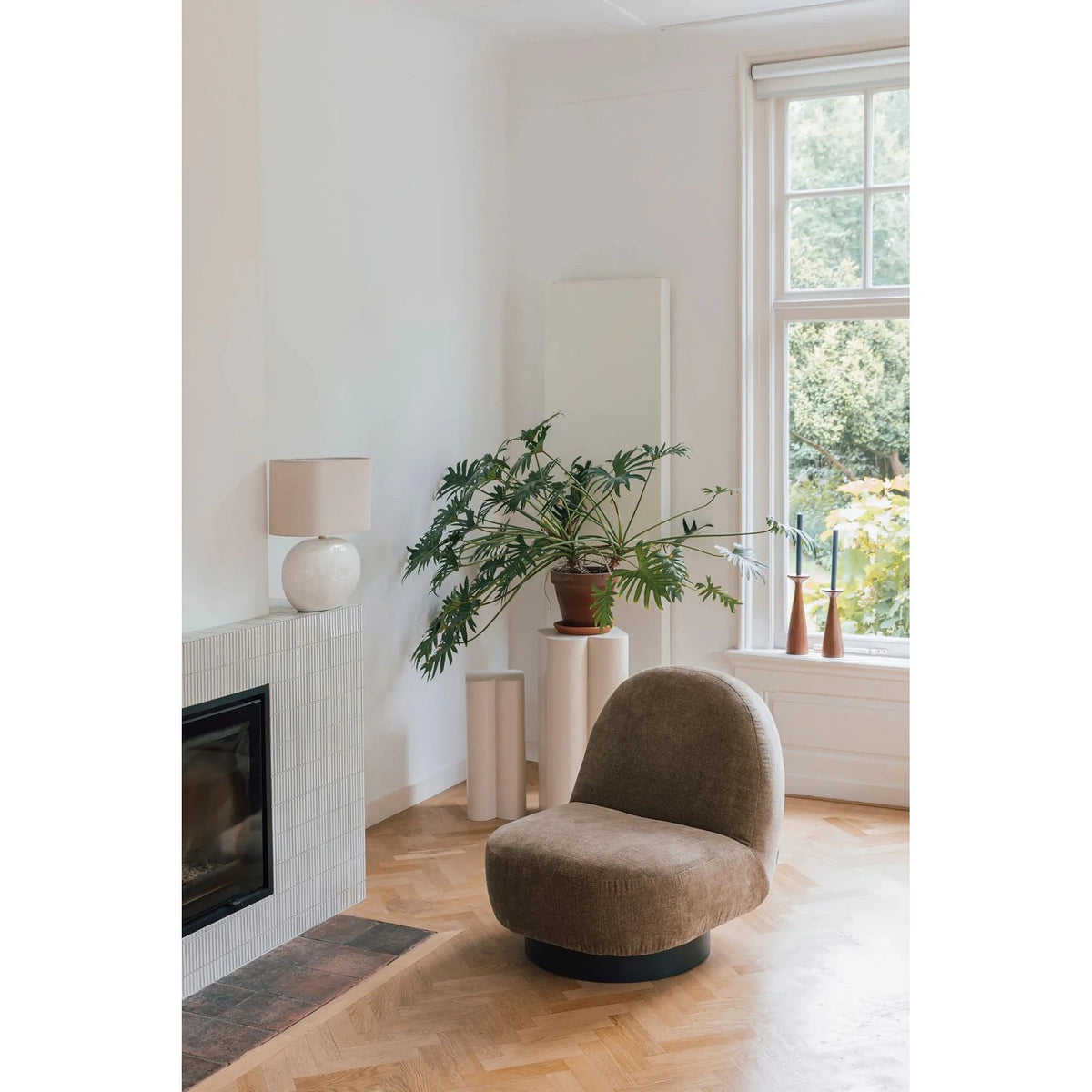 Lounge Chair Eden Moss Domestica – Lifestyle – By a Fireplace with Plant