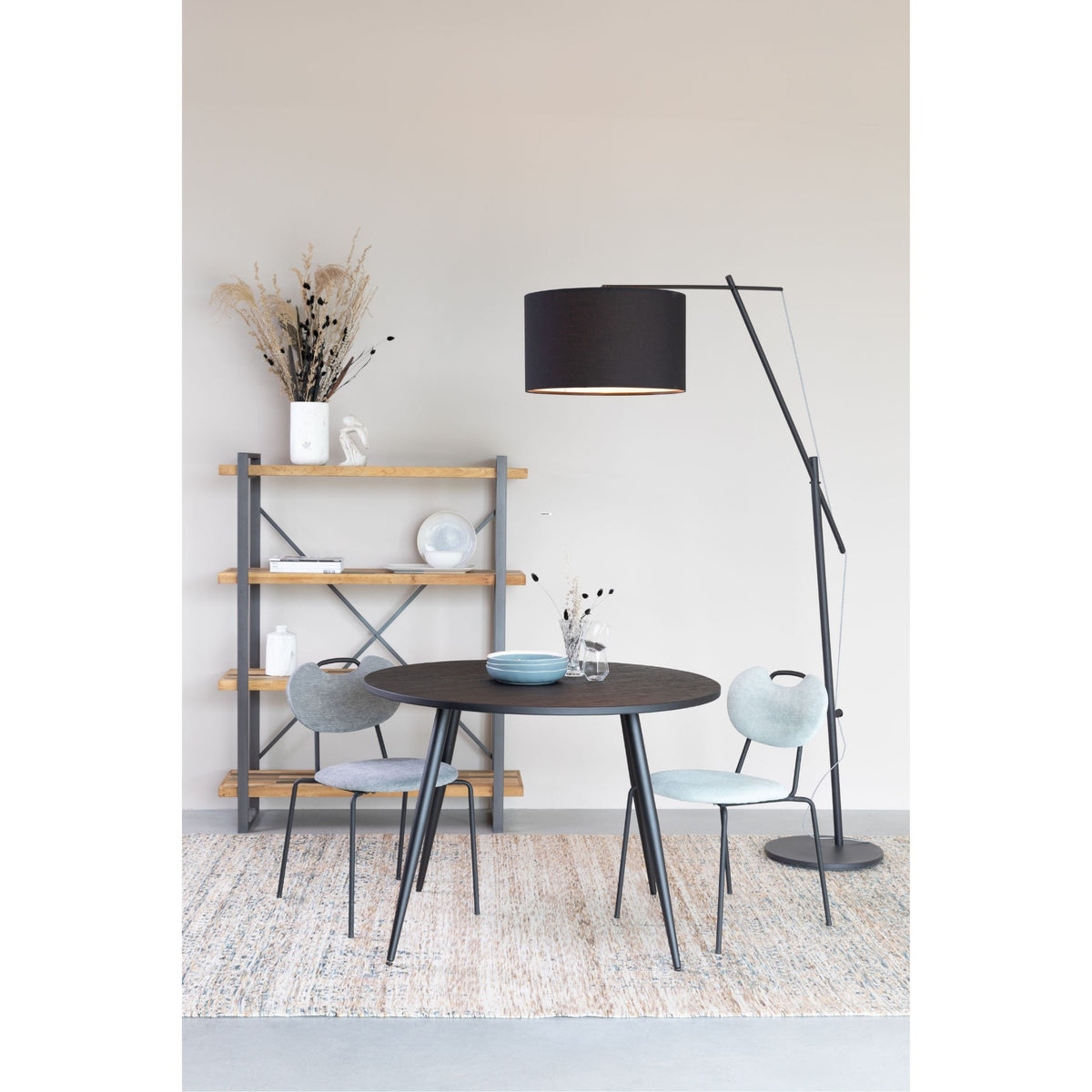 Dining Table Mo 110 Black Domestica – Lifestyle – With Floor Lamp and Shelving