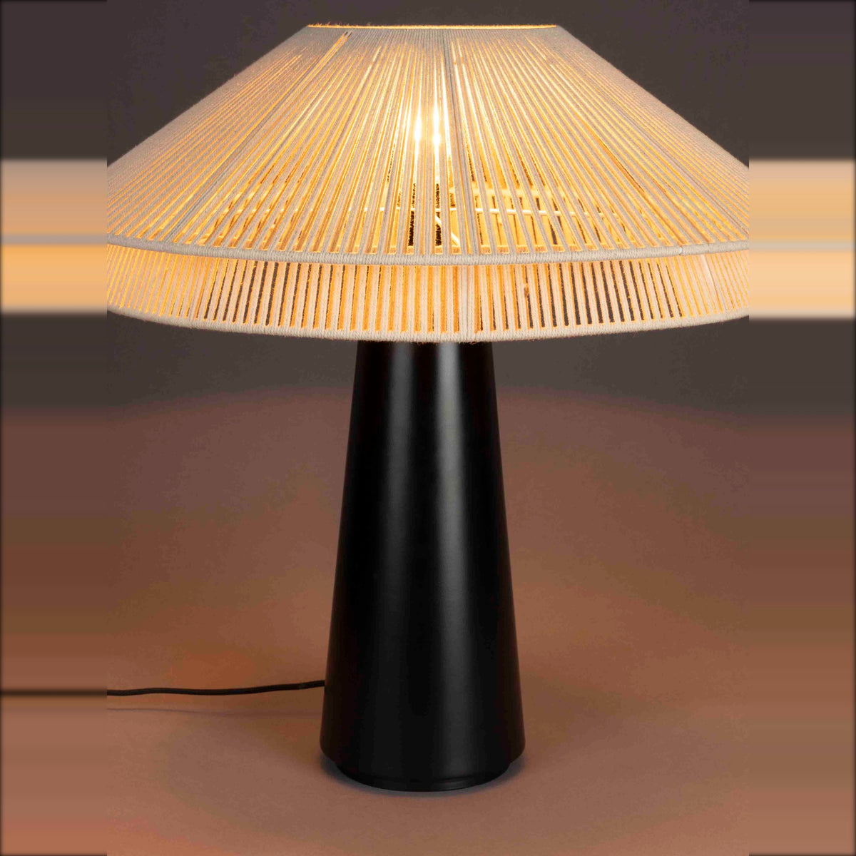 Table Lamp Elon Natural Domestica – Front View, Lit, on Dark Background