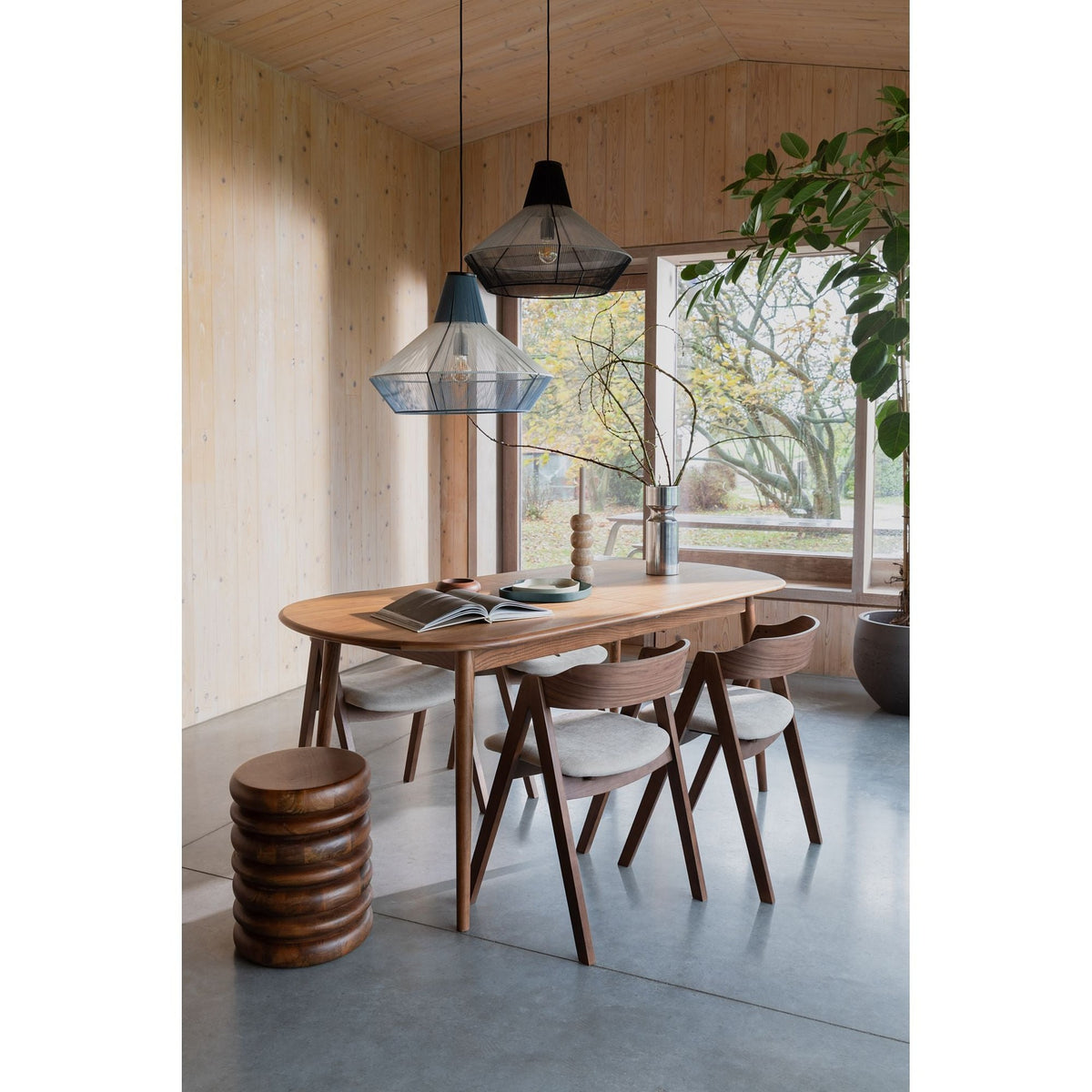 Stool Disc Brown Domestica – Lifestyle – In a Dining Room with Pendant Lights