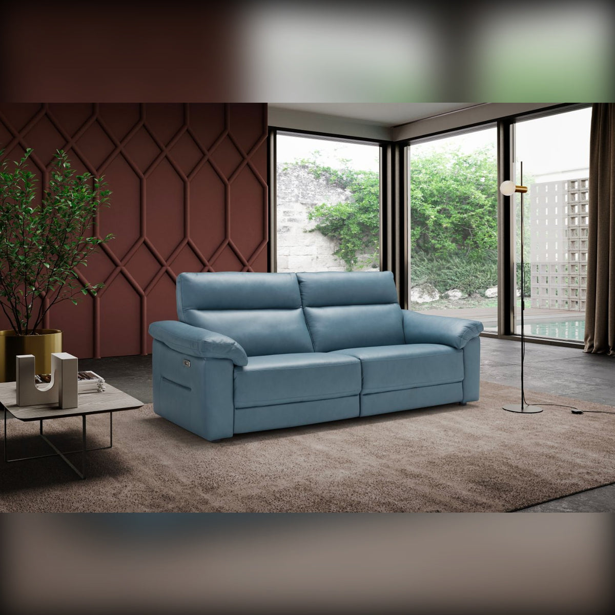 Belter Domestica – Lifestyle – Blue Leather Sofa by a Garden Window