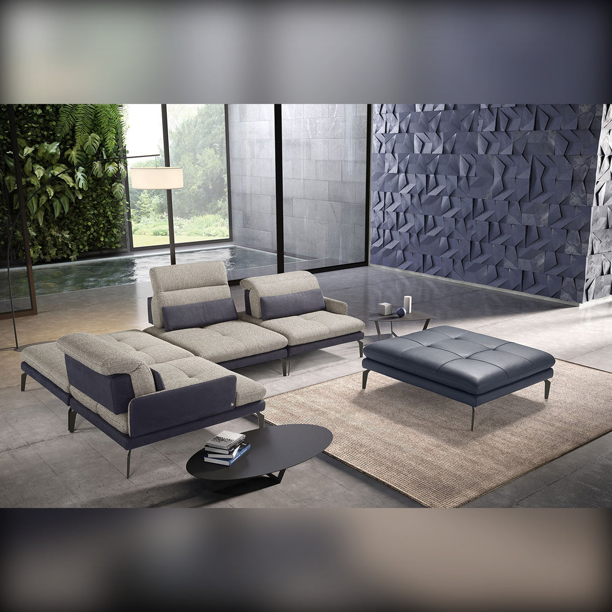 Jaclyn Domestica – Lifestyle – Grey and Navy Configuration with Ottoman in a Modern Living Room