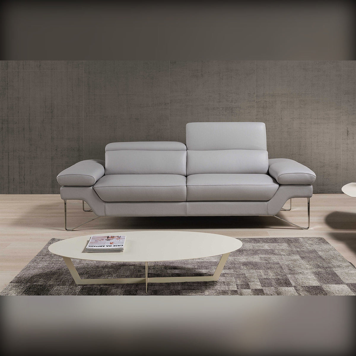 Princess Domestica – Lifestyle – Grey Sofa with Oval Coffee Table
