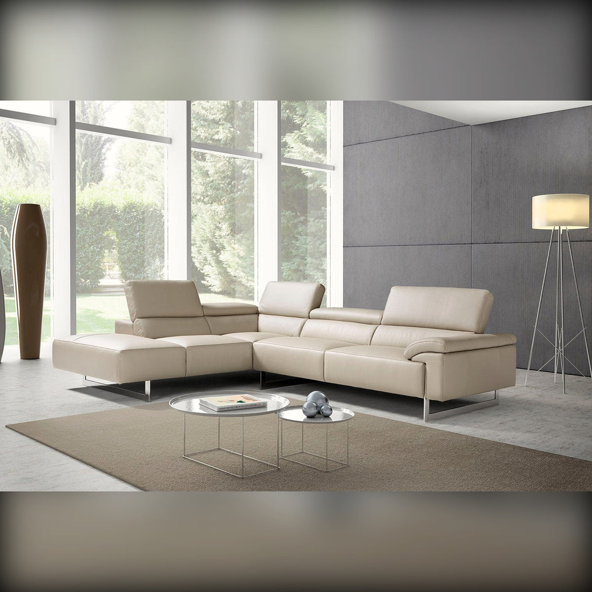 Malika Domestica – Lifestyle – Cream Corner Sofa by Large Windows