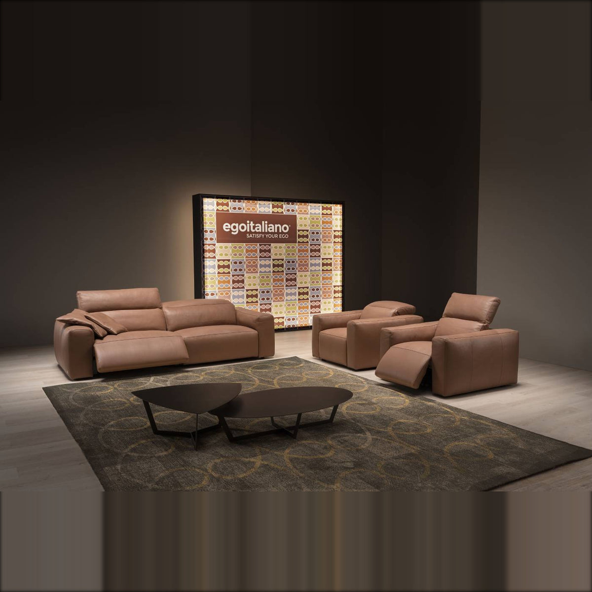 Beverly Domestica – Lifestyle – Tan Sofa and Armchair in a Dark Room