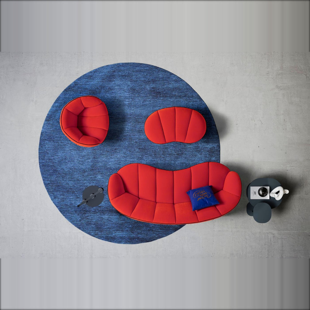 Shai Domestica – Top View – Red Version on a Round Blue Rug