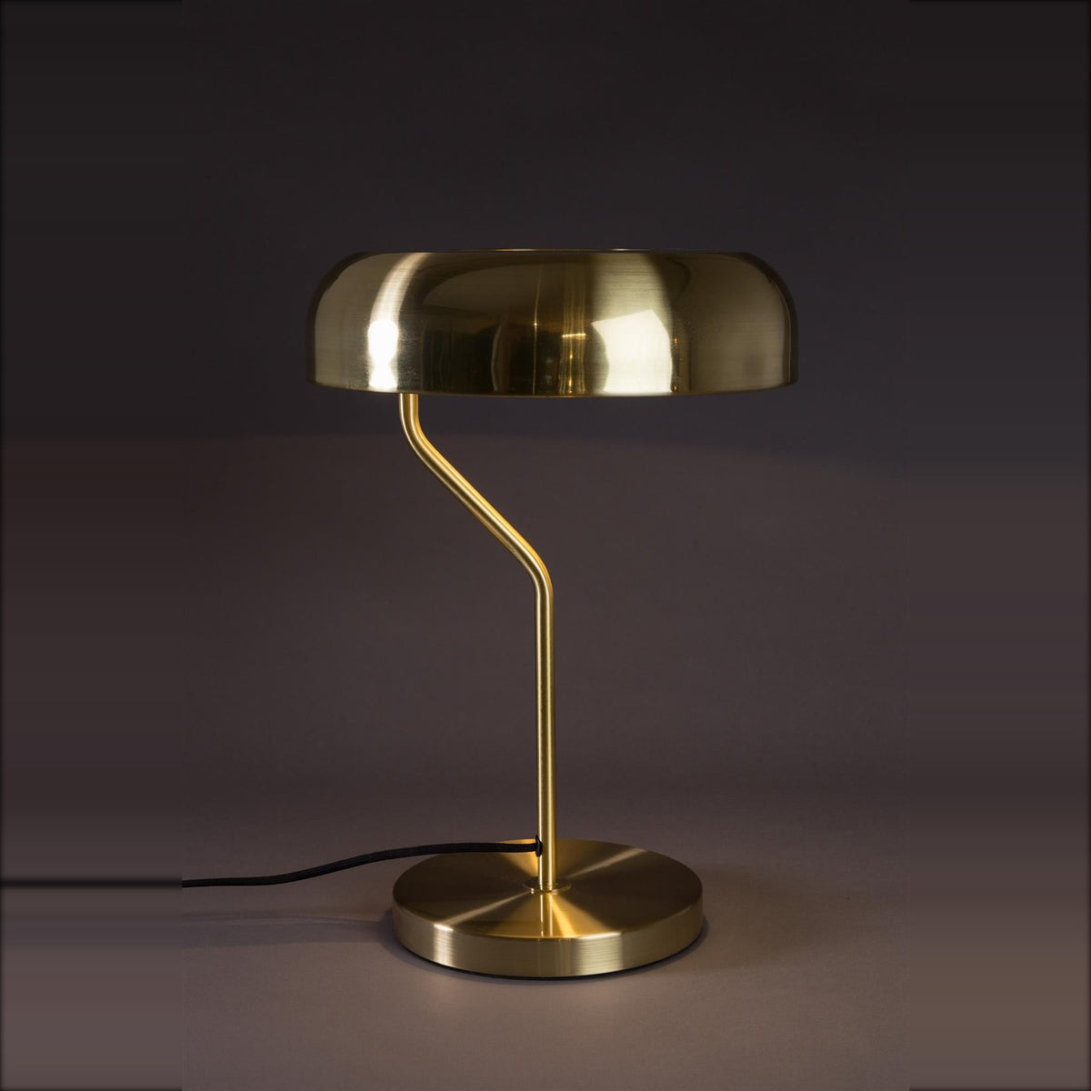 Desk Lamp Eclipse Brass Domestica – Lit Front View on Dark Background