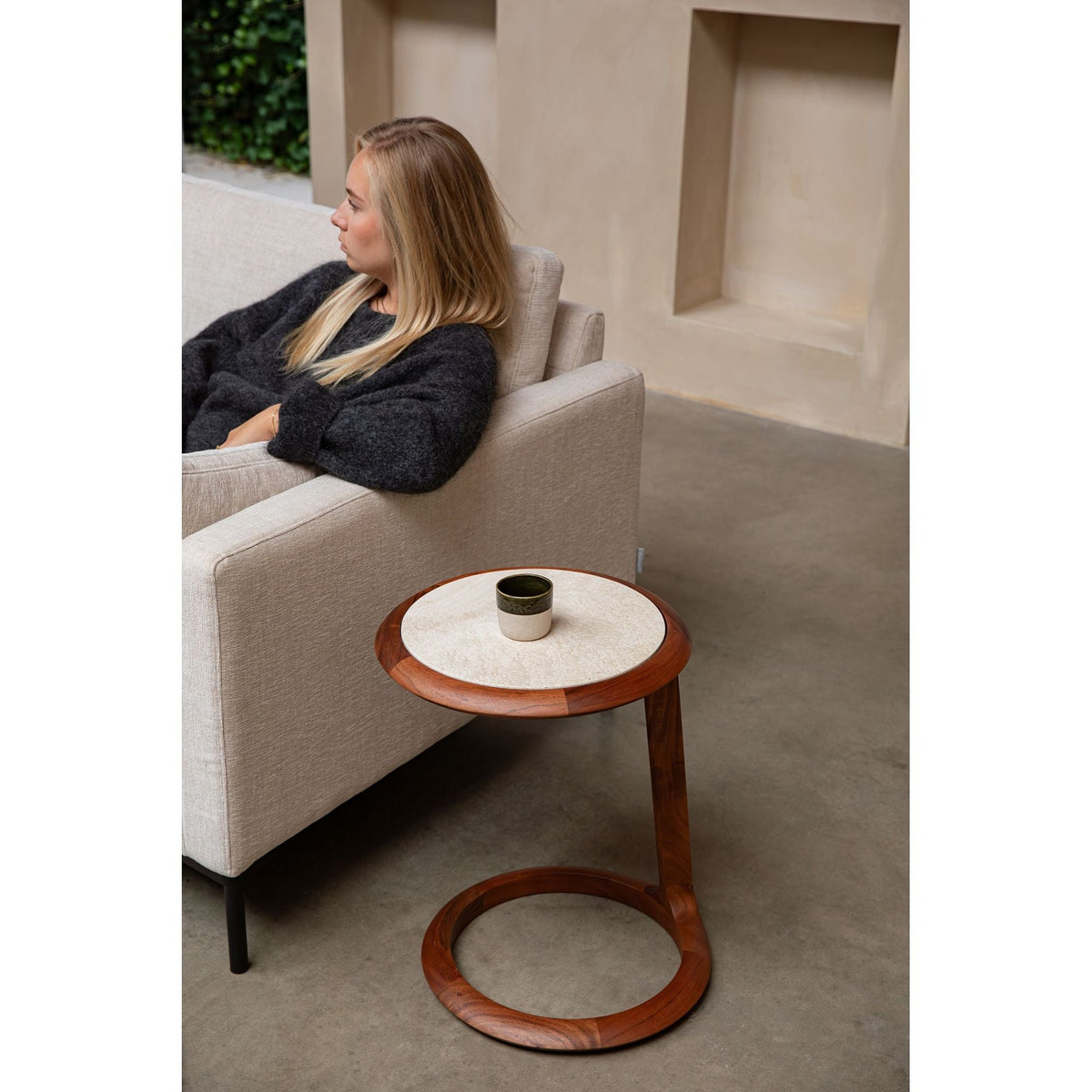 Side Table Doppio Domestica – Lifestyle – Person Relaxing on a Sofa Beside the Table