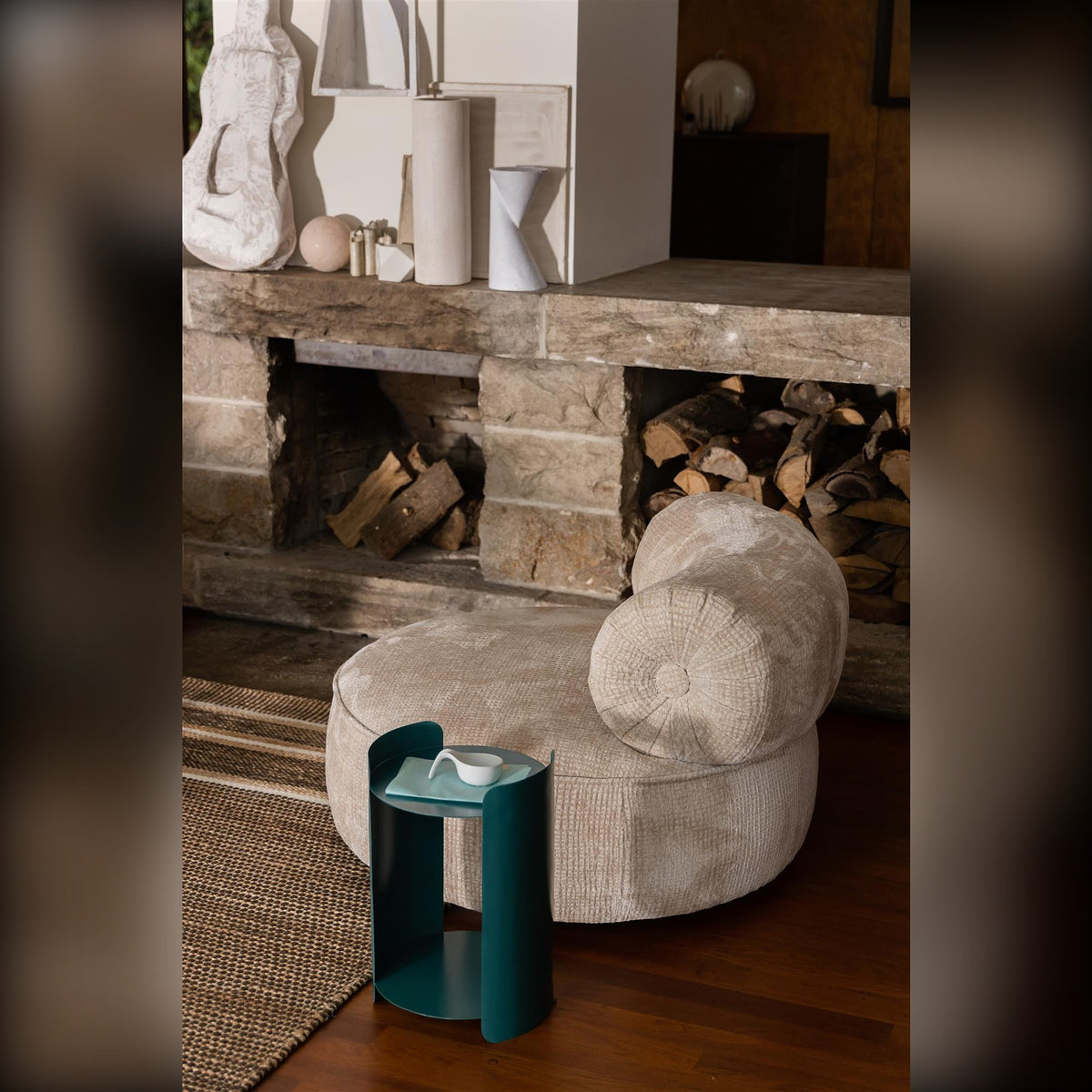 Lounge Chair Tilbury Natural Beige Domestica – Lifestyle – Beside a Fireplace