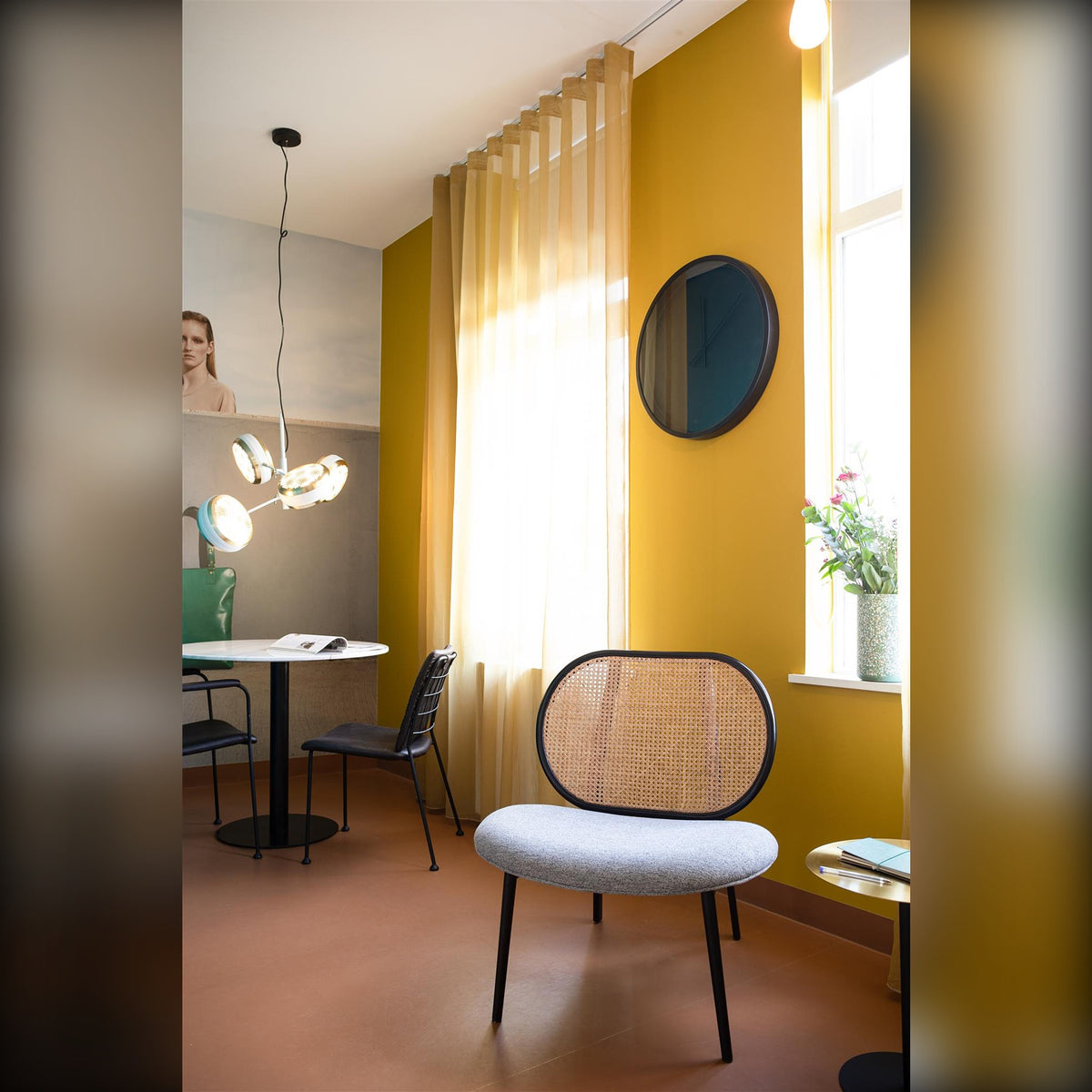 Lounge Chair Spike Natural Grey Domestica – Lifestyle – Mustard Room with Dining Table and Pendant Lights