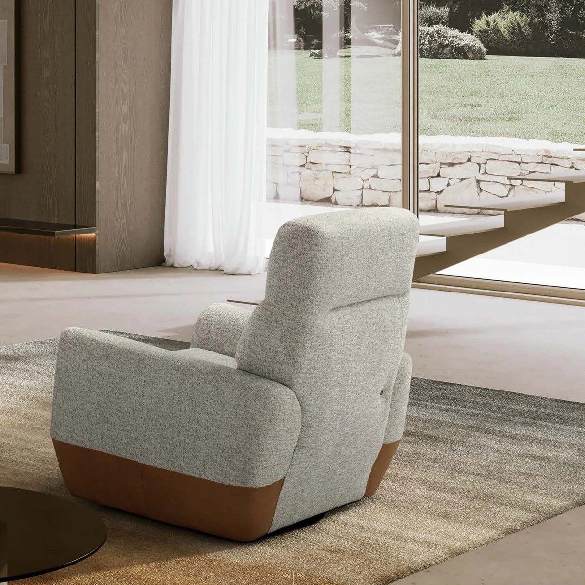 Swivel Recliner Armchair Neo Domestica – Lifestyle – Back Three Quarter View in a Living Room