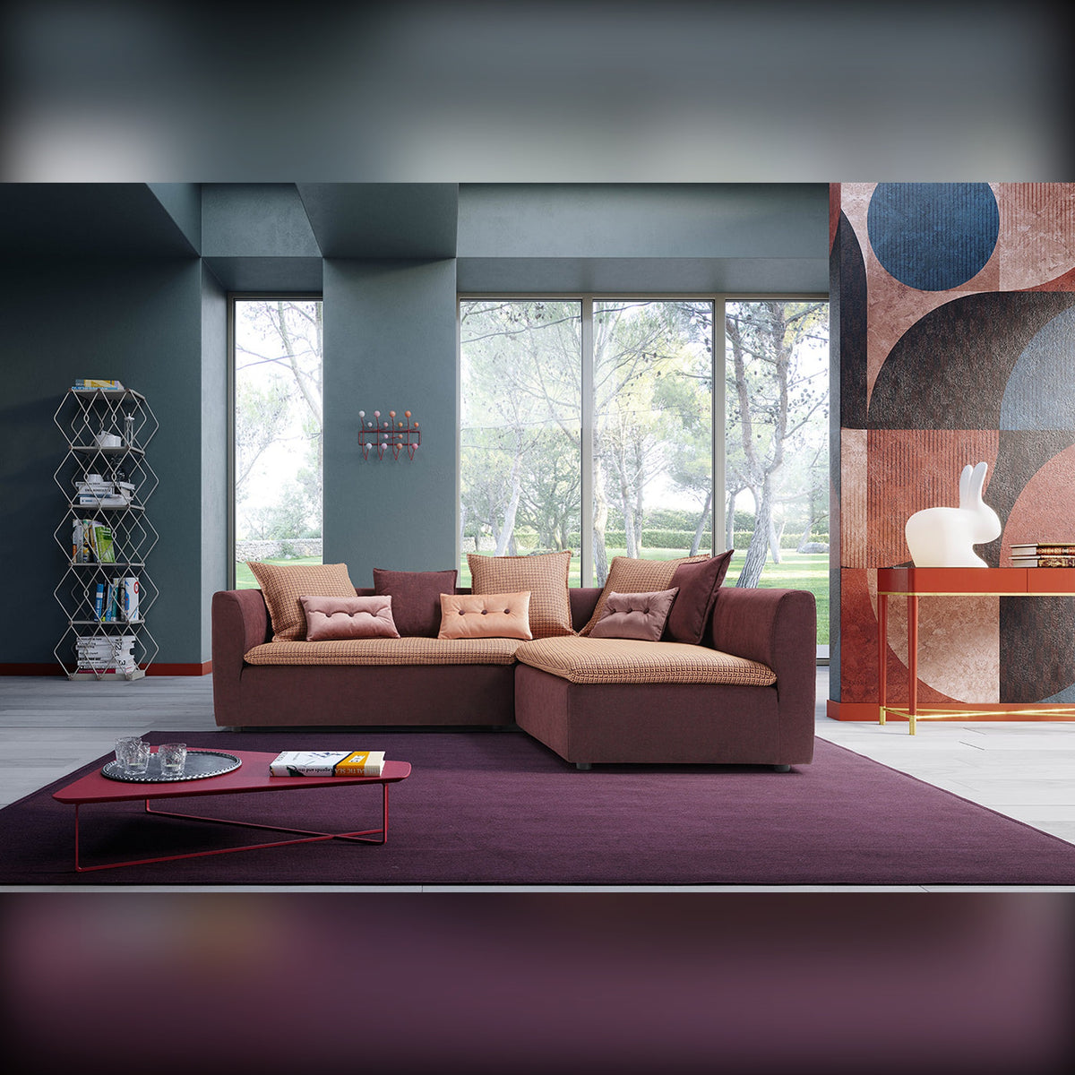 Buttons Egoitaliano Domestica – Lifestyle – Cushions on a Sofa in a Dark Living Room