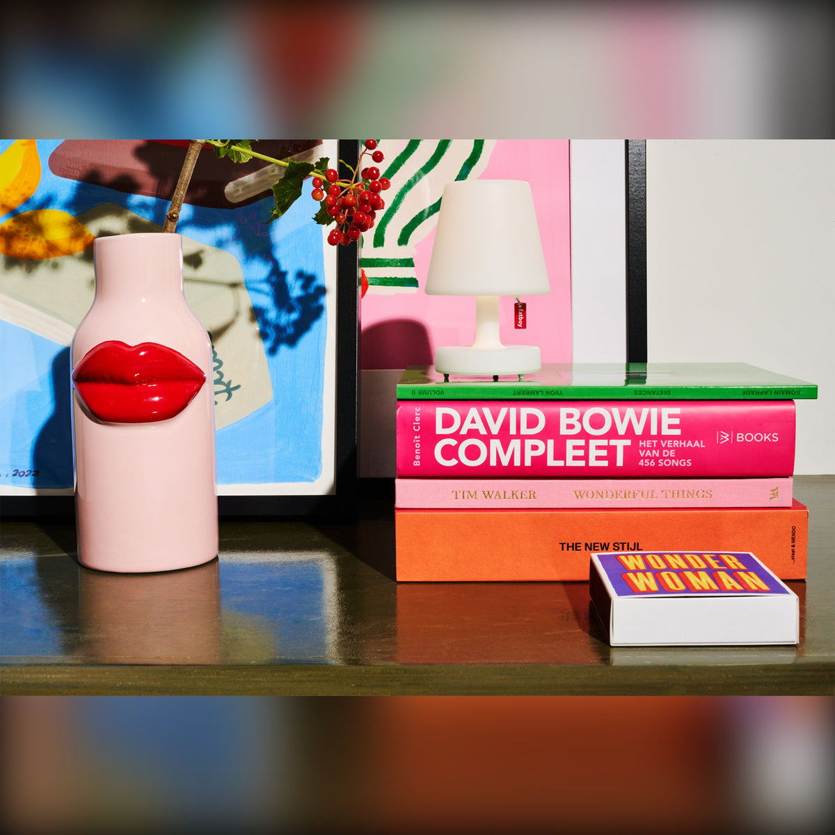 Edison la Surprise Domestica – Lifestyle – On a Stack of Books Beside a Pink Vase