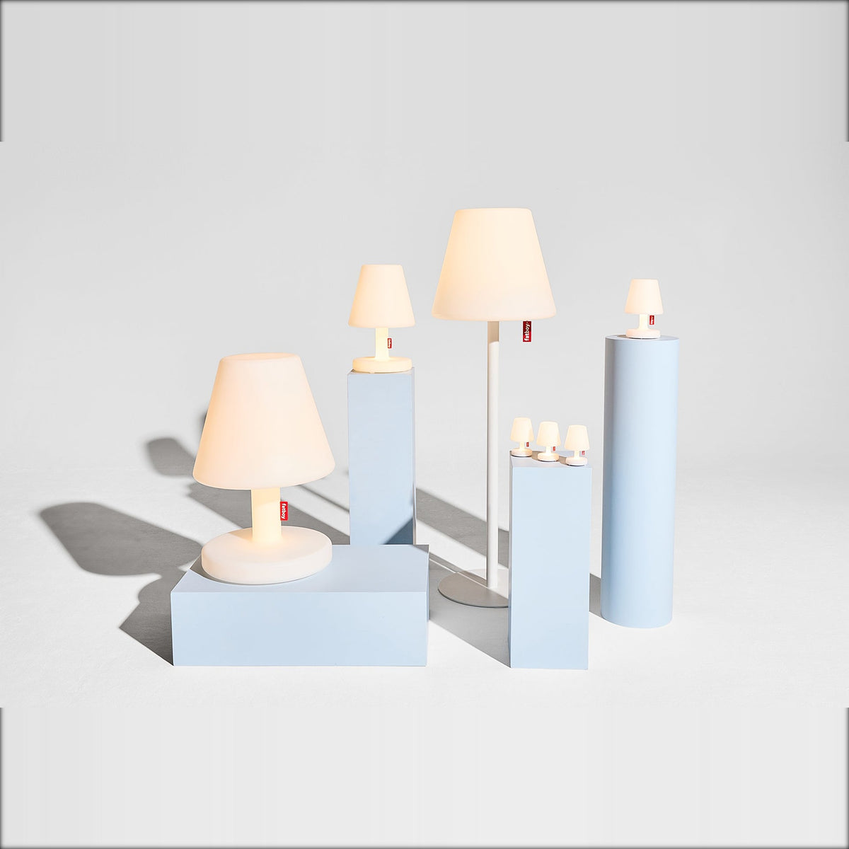 Edison the Grand Connect Domestica – Lifestyle – Lit Lamps on Pale Blue Blocks