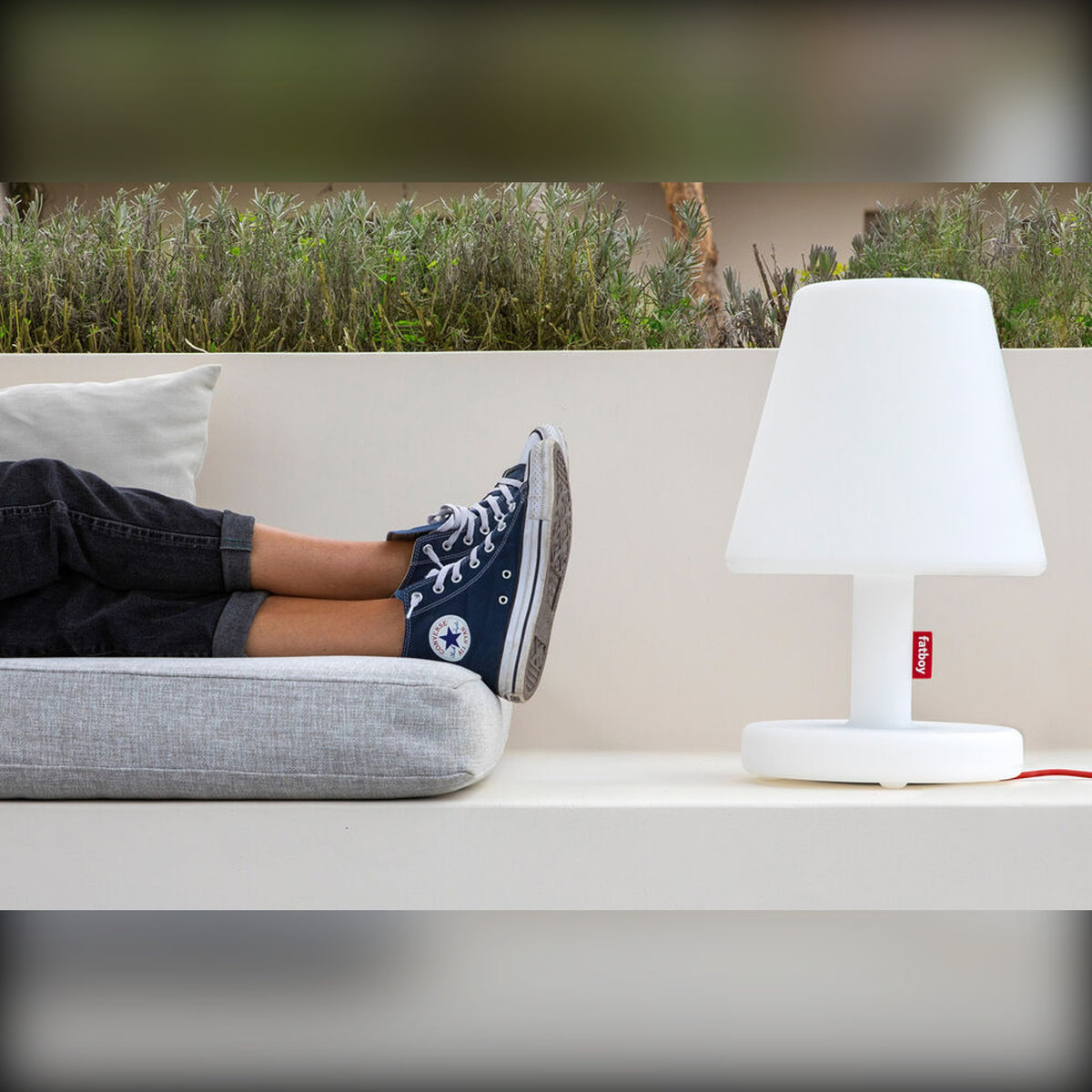 Edison the Medium White Domestica – Lifestyle – Person Resting Feet Beside the Lamp
