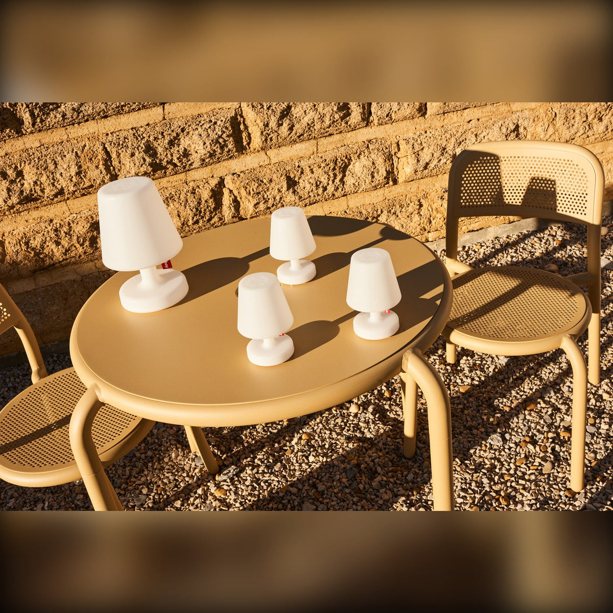 Edison the Mini Set 3 Pieces Domestica – Lifestyle – On a Low Outdoor Table with Chairs