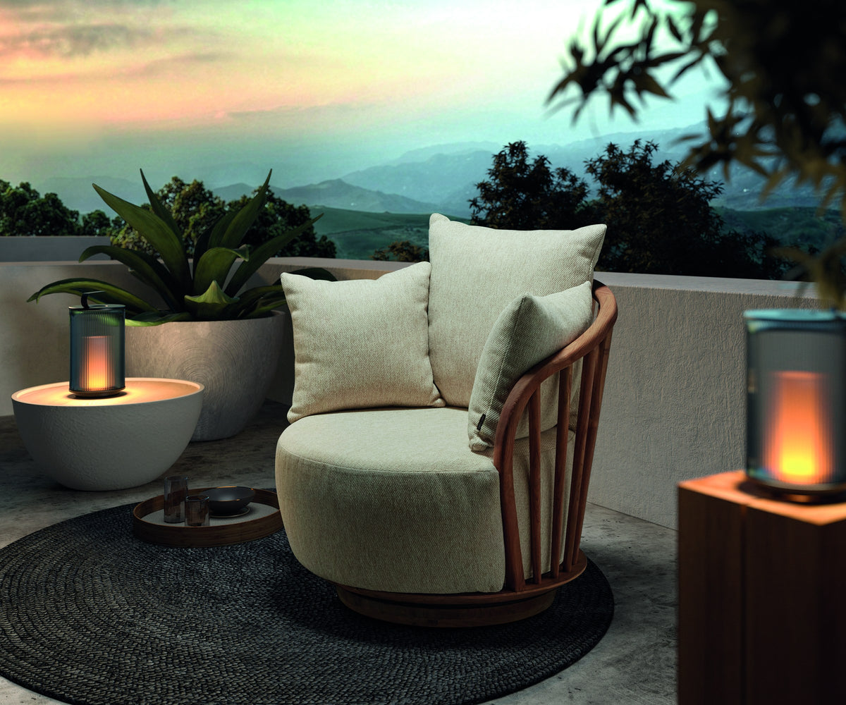 Lounge Chair Noel Teak Natural Cream Domestica – Lifestyle – On a Terrace at Dusk with Sea View