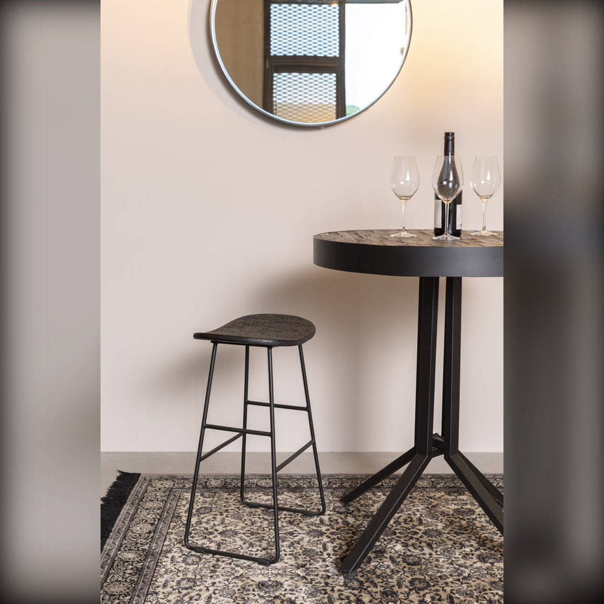 Counter Stool Tangle Black Domestica – Lifestyle – Beside a Round Bistro Table with Wine