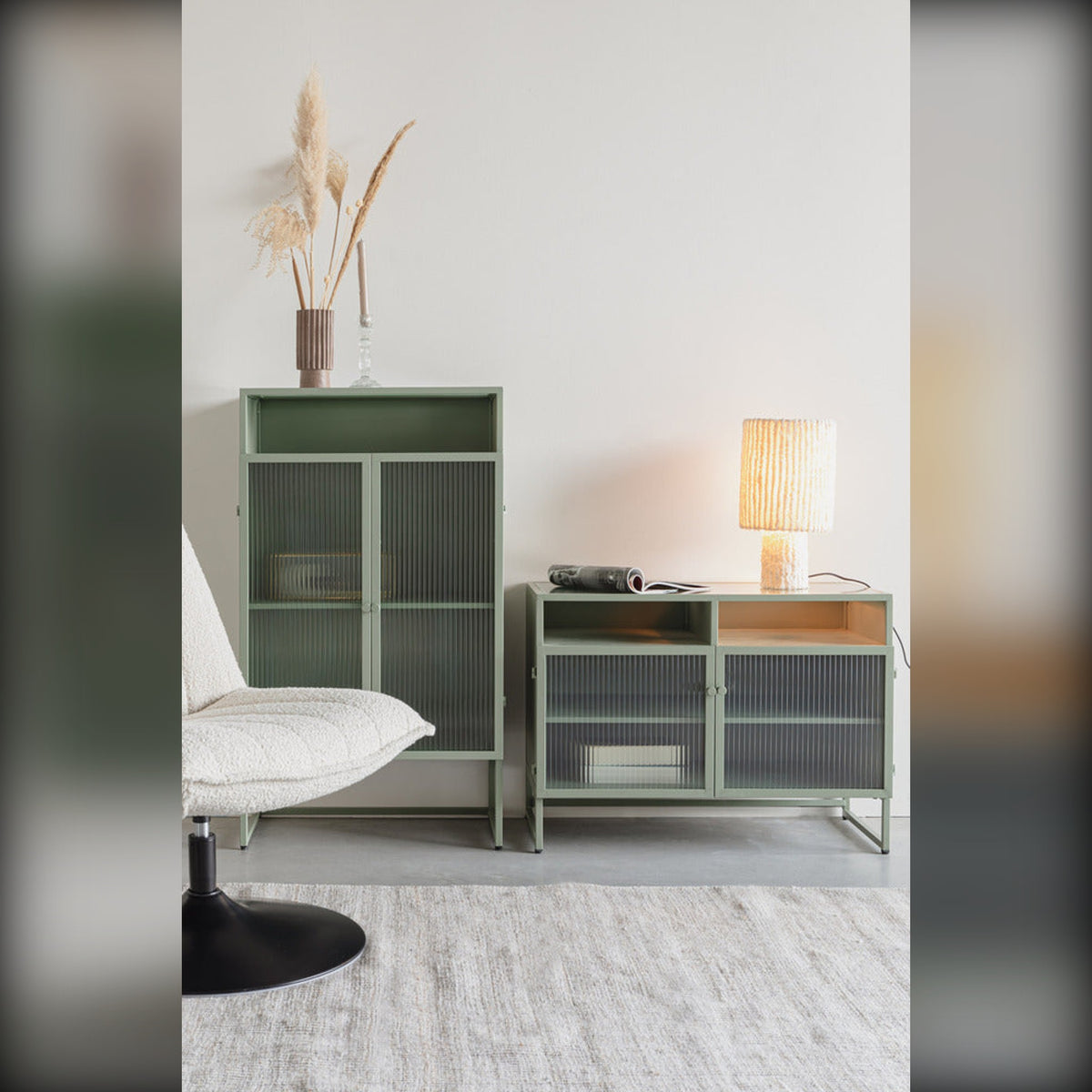 Cabinet Herbe Medium Green Domestica – Lifestyle – Living Room with Table Lamp and Tall Green Cabinet