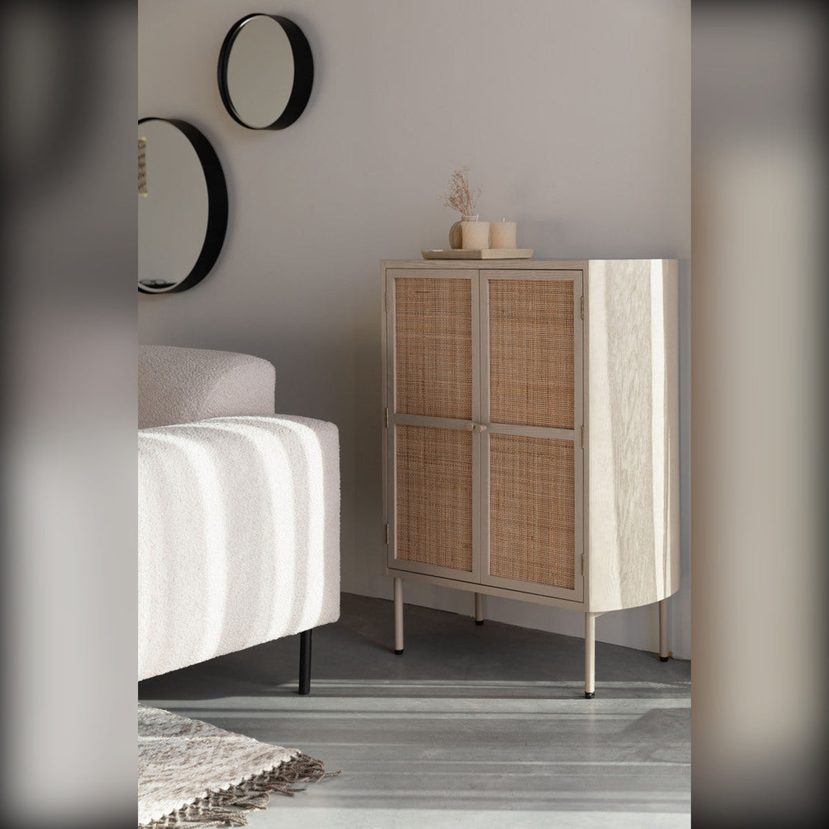 Cabinet Amaya Low 2 Doors Beige Domestica – Lifestyle – Beside a Sofa with Round Mirrors