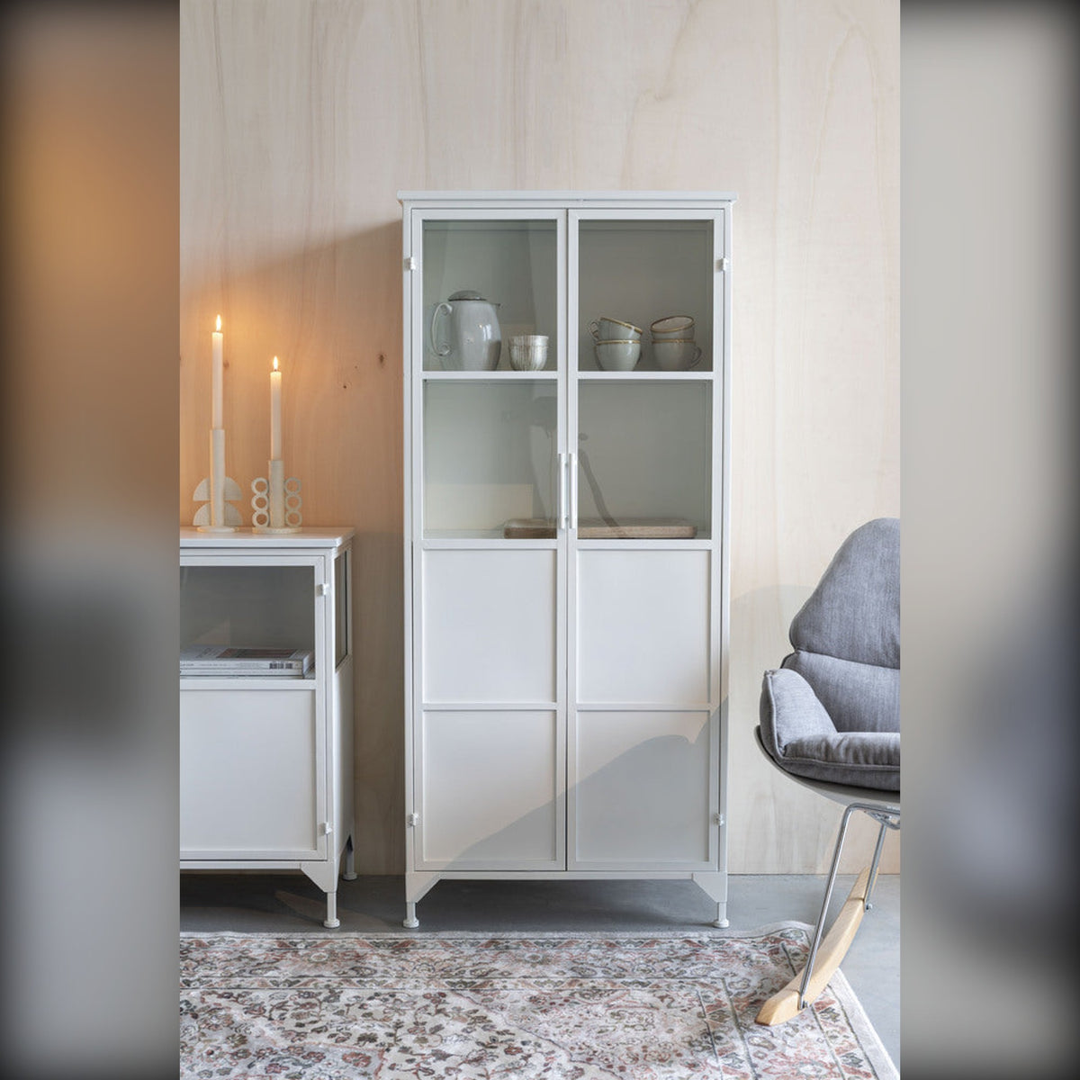 Cabinet Miya High 2do Domestica – Lifestyle – With Candles and Grey Rocking Chair
