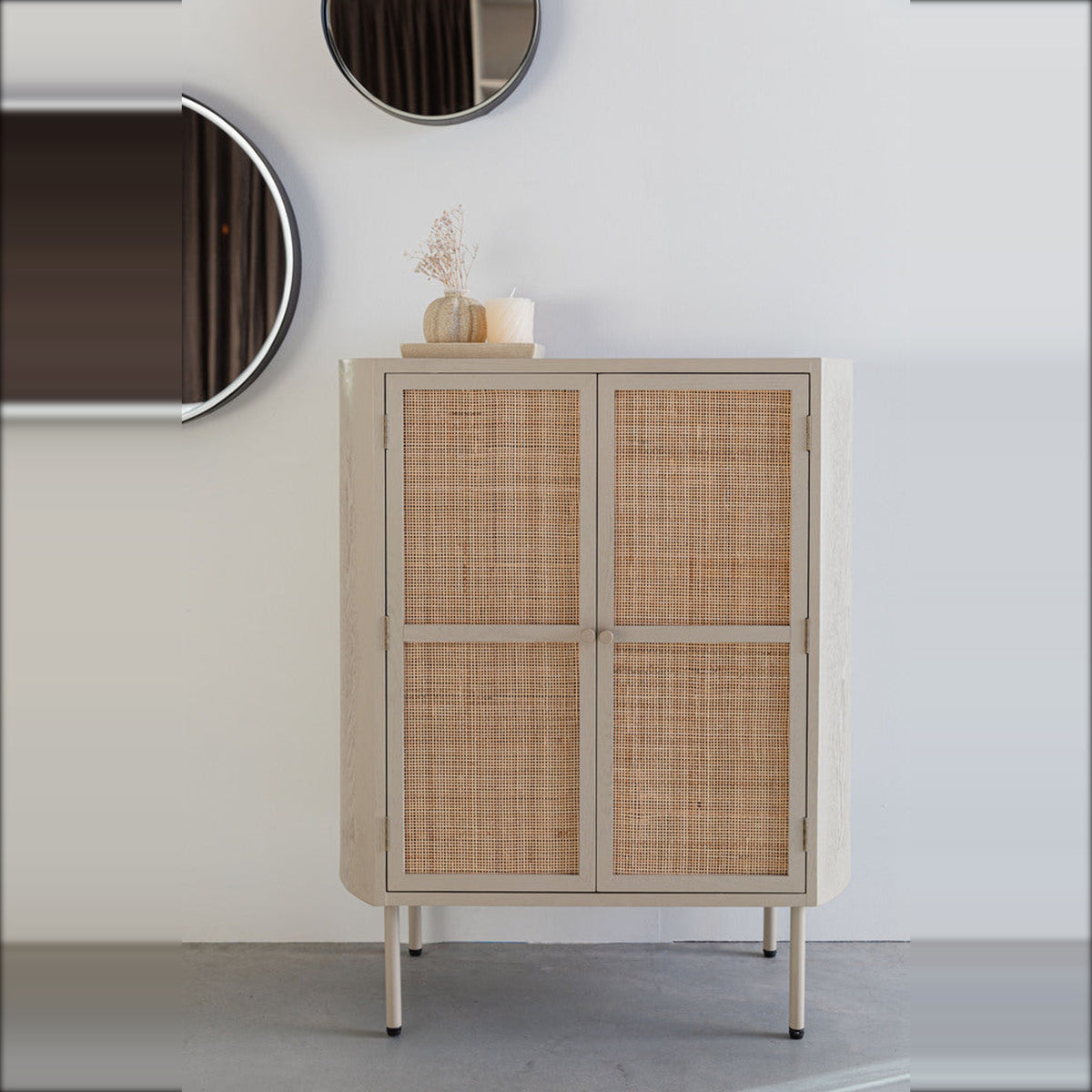 Cabinet Amaya Low 2 Doors Beige Domestica – Lifestyle – Below Round Mirrors with a Vase