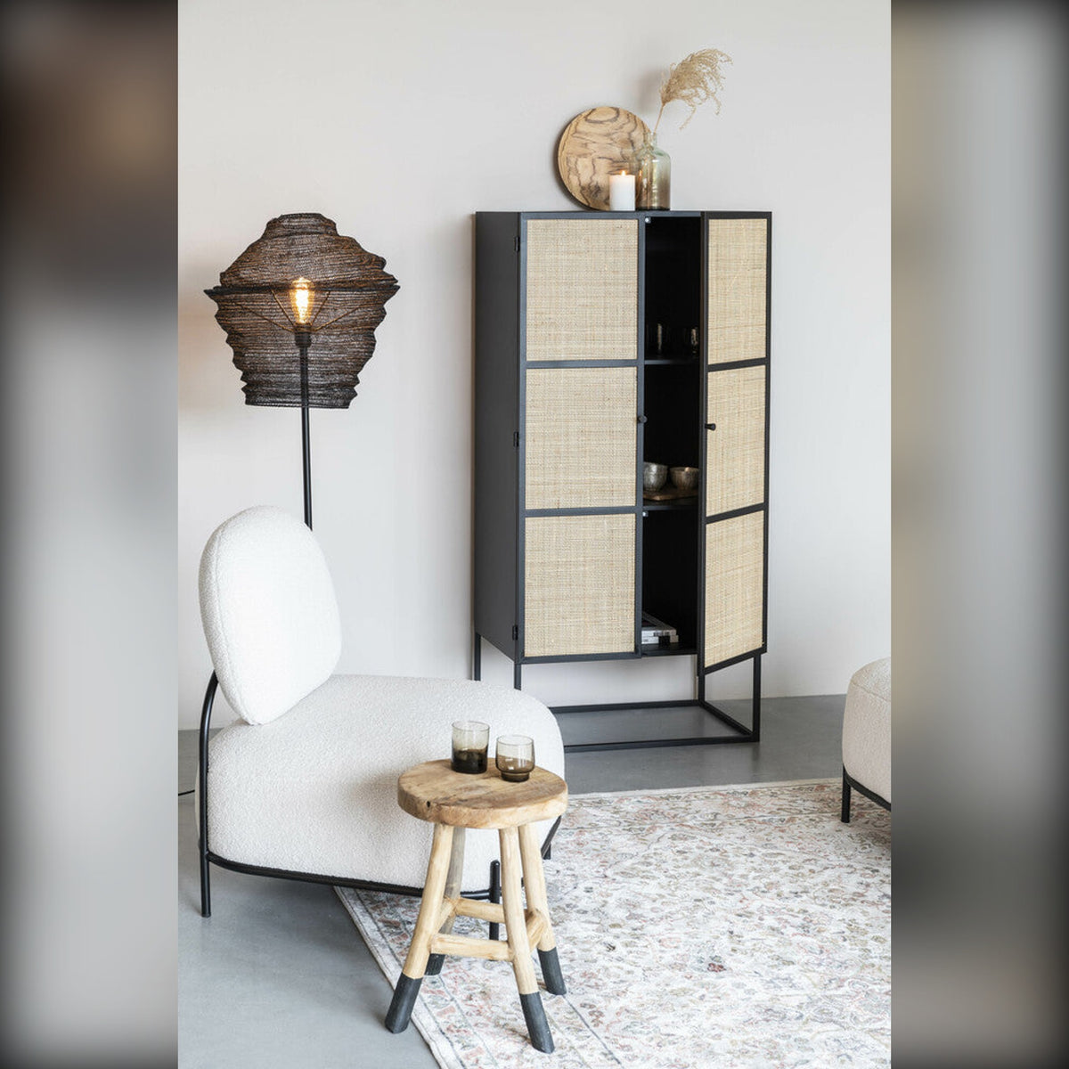 Cabinet Guuji High 2 Doors Black Domestica – Lifestyle – Doors Open in a Living Room