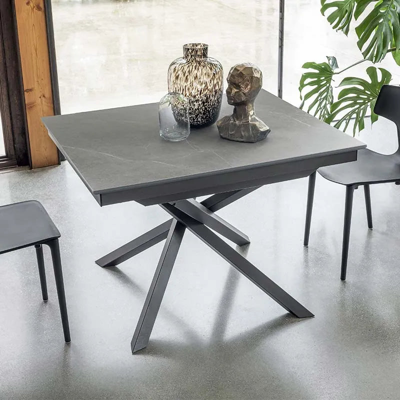 Table Tokyo Extendable 160x90 Domestica – Lifestyle – Crossed Legs – Shown in Grey Ceramic