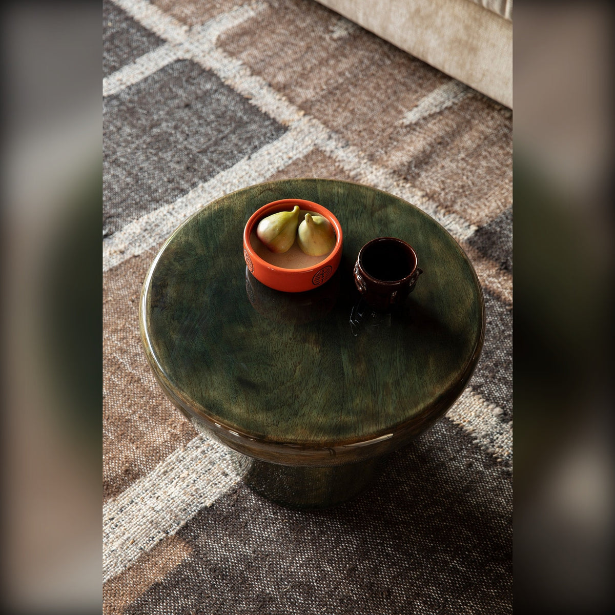 Side Table Mush L Green Domestica – Lifestyle – On a Rug with a Plant Pot