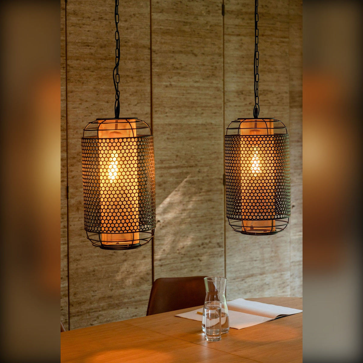 Pendant Lamp Archer M Black Domestica – Lifestyle – Lit Pendants Above a Dining Table