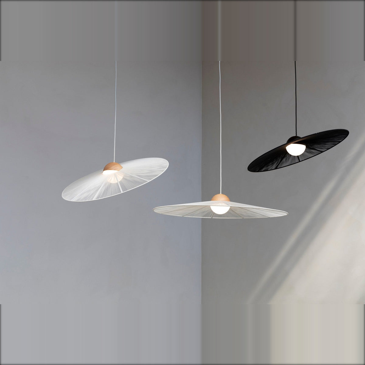 Pendant Lamp Belle S Black Domestica – Lifestyle – Three Pendants Against a Grey Wall